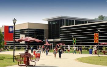 students walking outside a modern college building