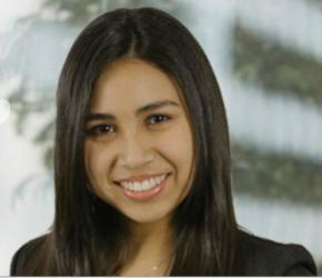 headshot of a smiling professional woman