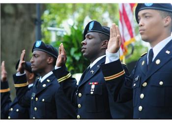 military cadets saluting in uniform