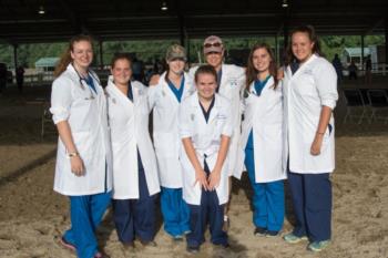 veterinary science students posing in lab coats