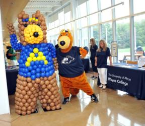 mascots and people at a university event