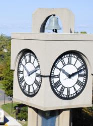 clock tower with four clock faces