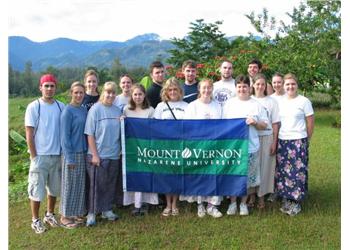 group holding a 'mount vernon nazarene university' banner