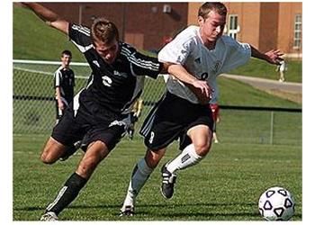 two soccer players in a match