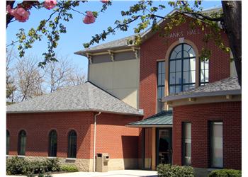 a modern looking campus building with glass windows