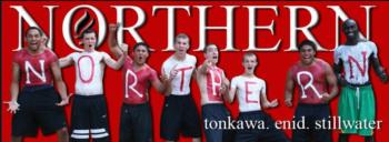 students spelling out 'northern' at a sports event