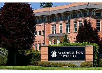 george fox university sign with brick building