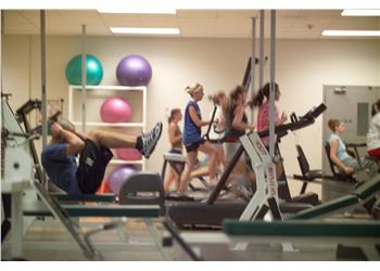 people exercising in a gym