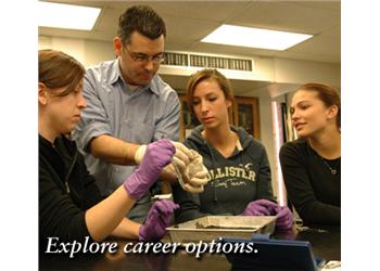 lab class examining specimen with 'explore career options.'