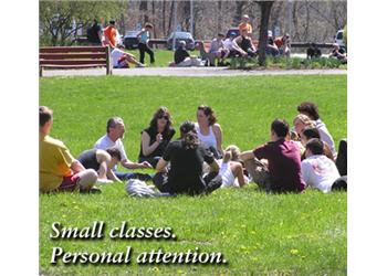 outdoor student gathering with 'small classes. personal attention.'