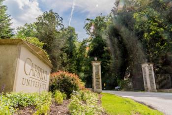 entrance sign to cabrini university