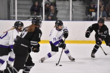 women's hockey game on the ice