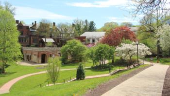 campus buildings surrounded by greenery