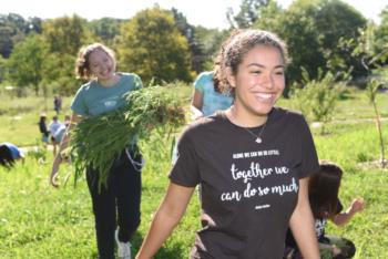 student volunteering in a garden