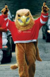 campus mascot in red jersey gesturing victory