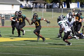 football game in action on field