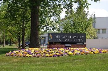 delaware valley university sign with flowers