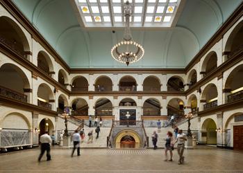 grand hall with vaulted ceiling &amp; people
