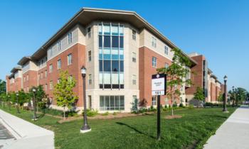 exterior of campus residential building on sunny day