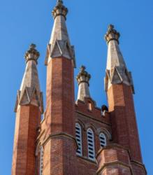 tall spires of a gothic-style campus building