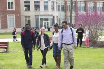 students walking on campus, spring setting