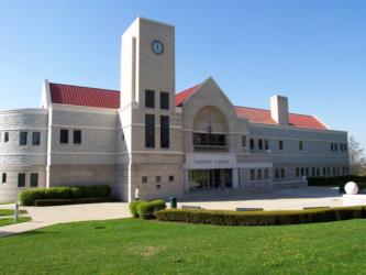 modern library building with a clock tower