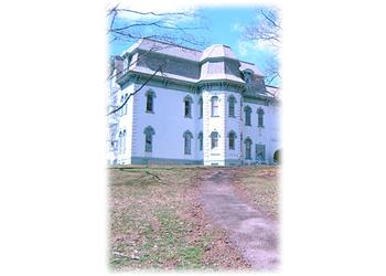 historic building with turret and trees