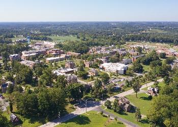 aerial view of campus with green spaces and buildings