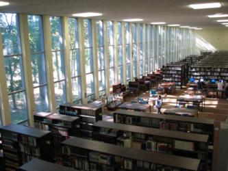 manor college library interior with bookshelves