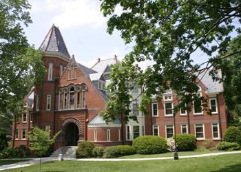 brick building with pointed arch entryway