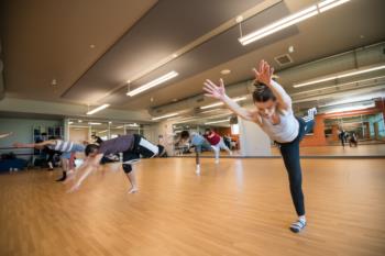 dance practice with instructor leading students