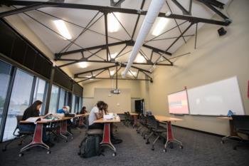 classroom with students focused on their studies