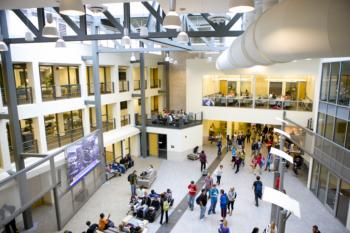 busy atrium with students and balconies