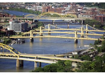 daytime view of bridges over river