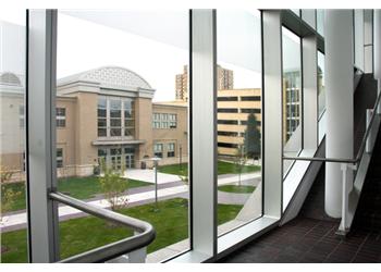 view of campus building through window