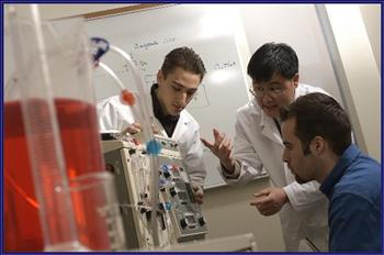 students working with lab equipment