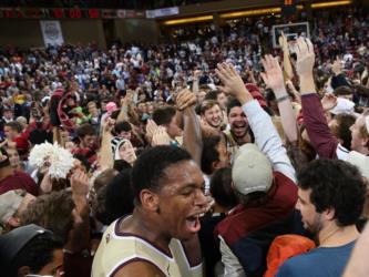 crowd cheering at a basketball game