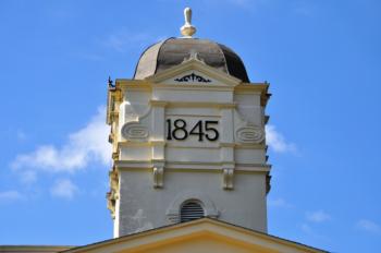 close-up of a building tower with the year 1845