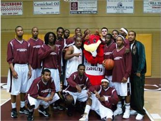 basketball team photo with mascot and coaches