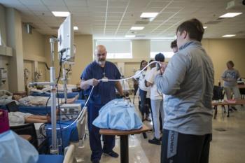 nursing lab with students and instructor