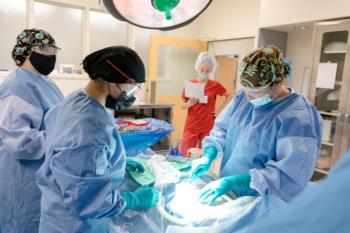 medical students practicing in a simulation lab