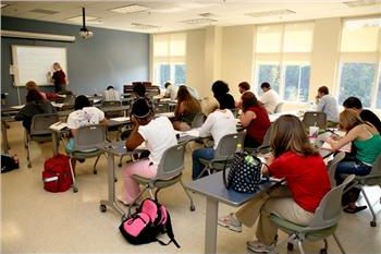 classroom with teacher and students