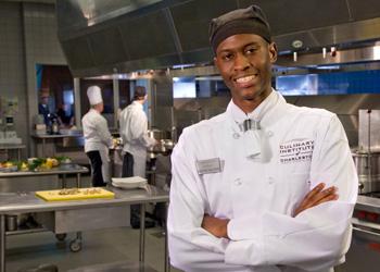 chef in kitchen with culinary students