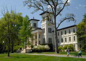 daytime view of campus building with clock tower