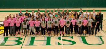 large group wearing pink in gym, 'BHSU'