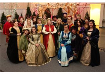 group of people in historical costumes posing