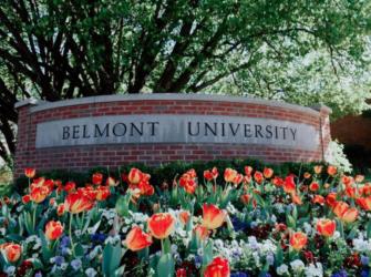 entrance sign 'BELMONT UNIVERSITY' with flowers