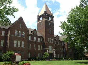 historic brick building with clock tower