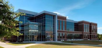 contemporary college building with glass facade