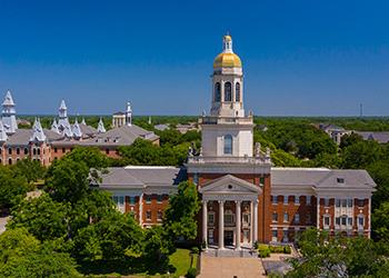 aerial view of a university with a golden dome